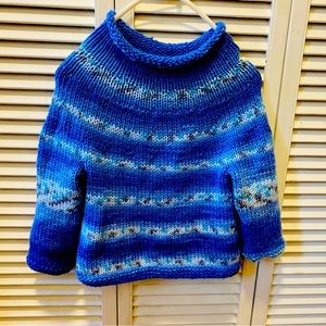 Hand knit child’s sweater